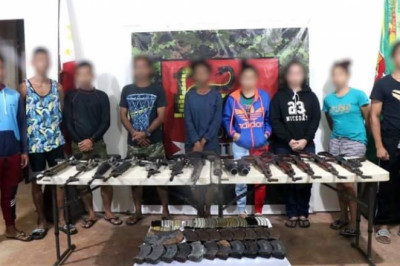 9 NPA members with 16 guns surrender to soldiers in Surigao del Norte