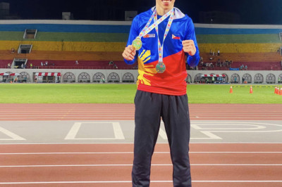 Ex-UM track star gets 2 medals in Taiwan