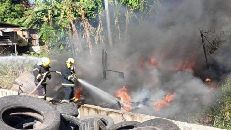 Old tire stockpile catches fire in Mati City