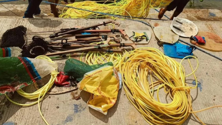 COAST GUARD ARRESTS 6 ILLEGAL COMPRESSOR FISHERS IN DAVAO ORIENTAL